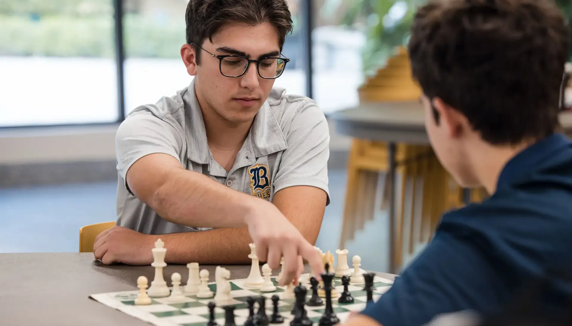 Belen Jesuit students playing chess.