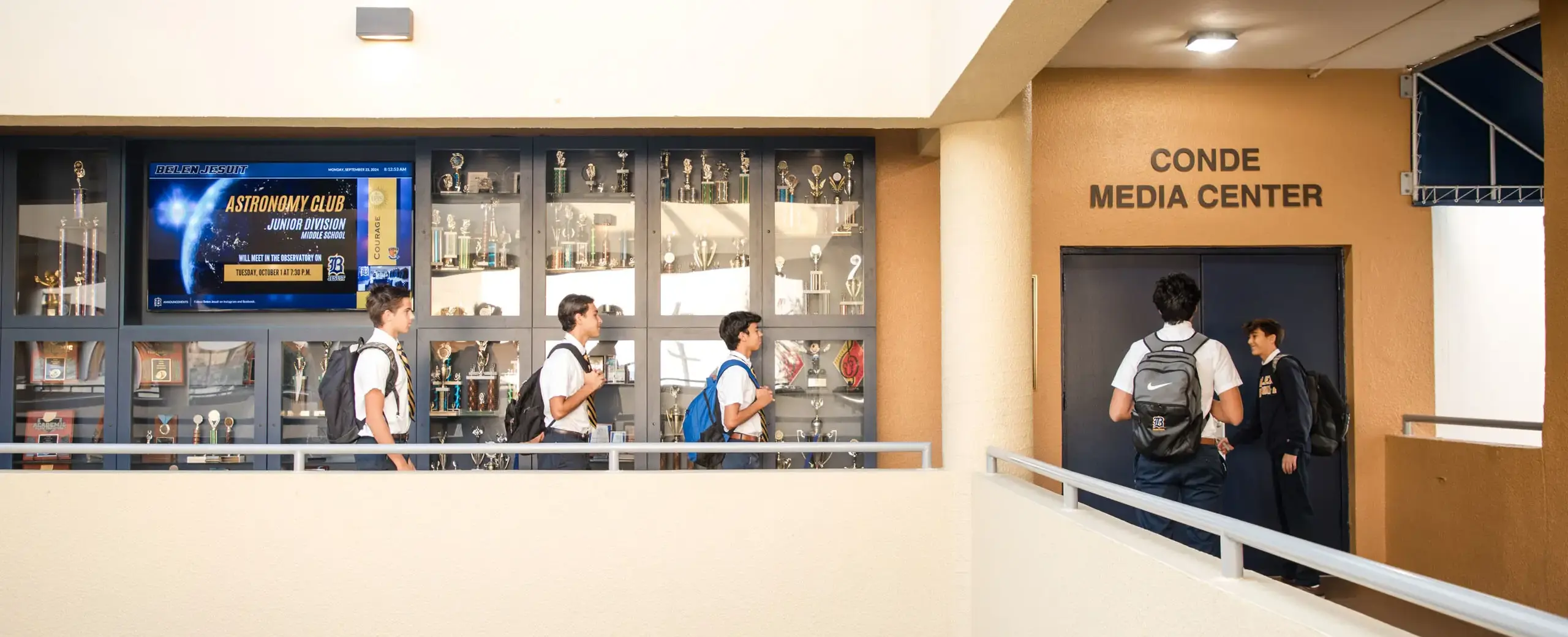 Belen Jesuit students entering the Conde Media Center.
