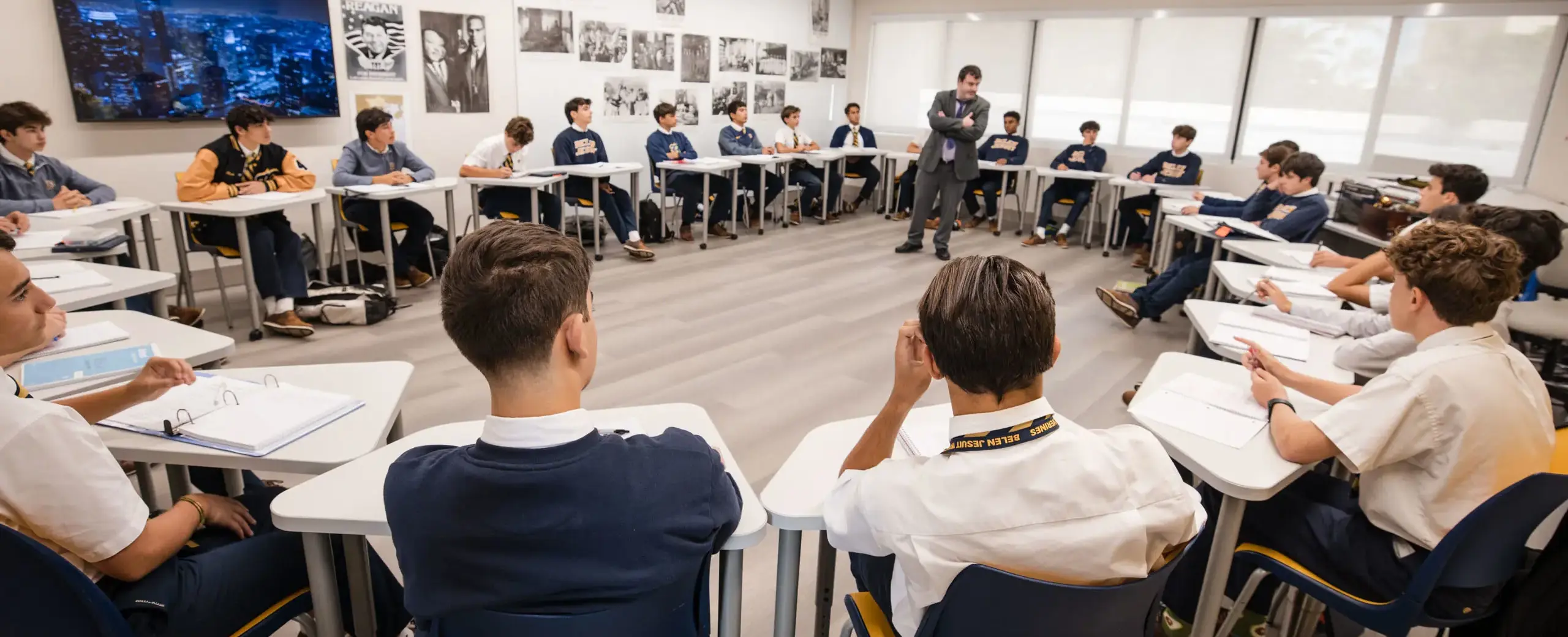 Belen Jesuit students sitting at their desks in a class.