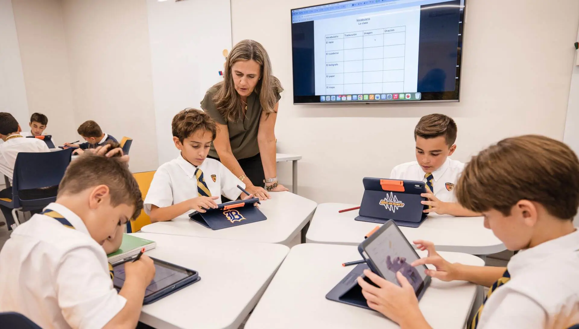 Belen Jesuit Middle School students solving problems in a class.