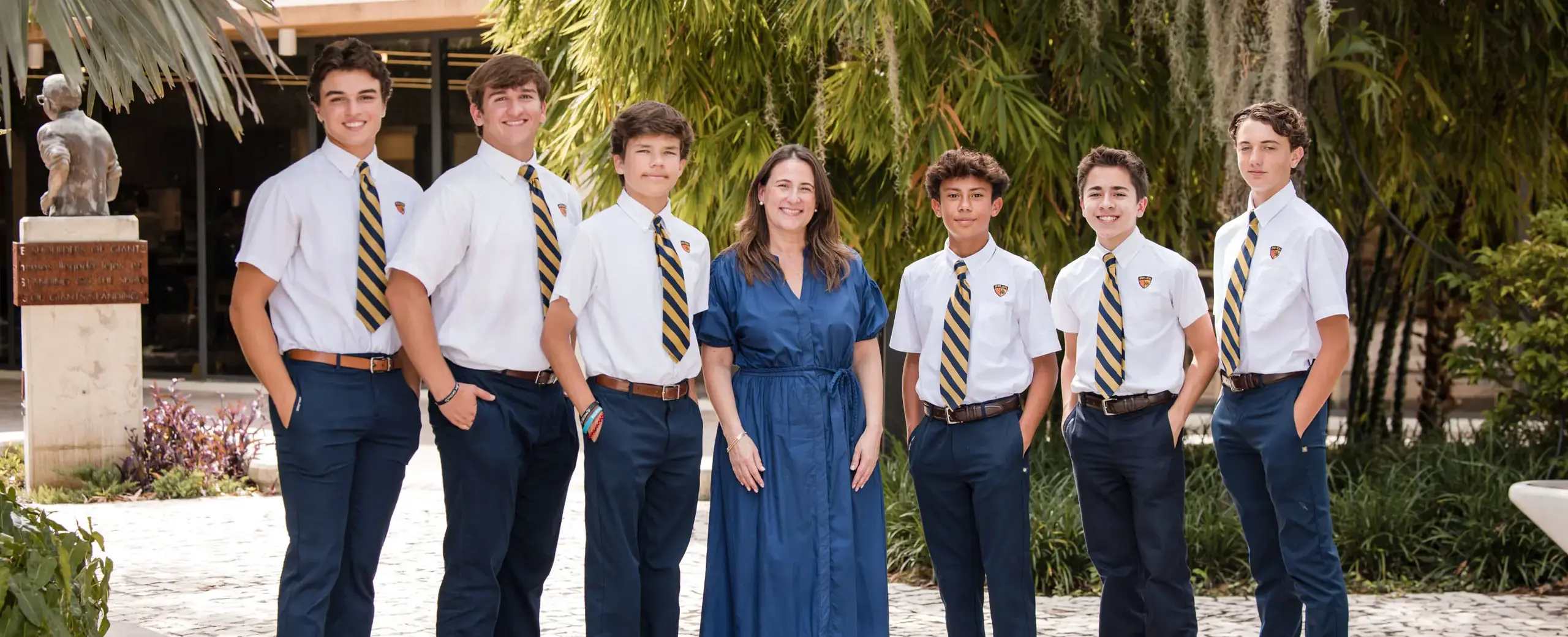 Belen Jesuit students with teacher.