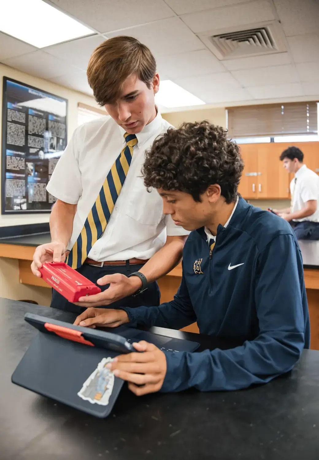 Belen Jesuit students in a science class.
