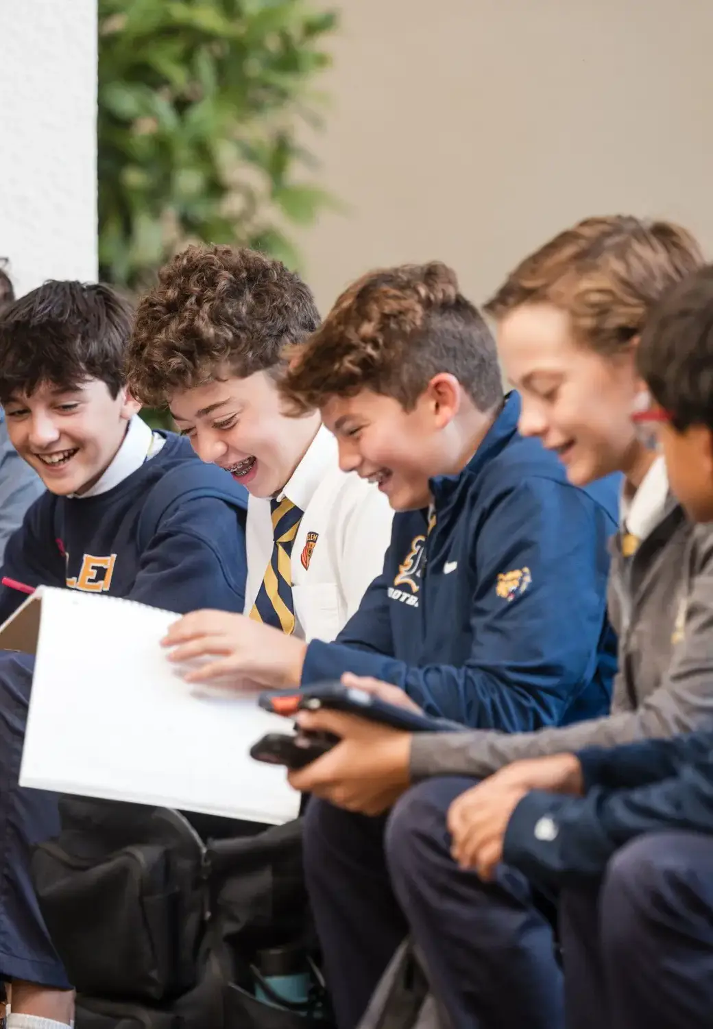Students reading and laughing