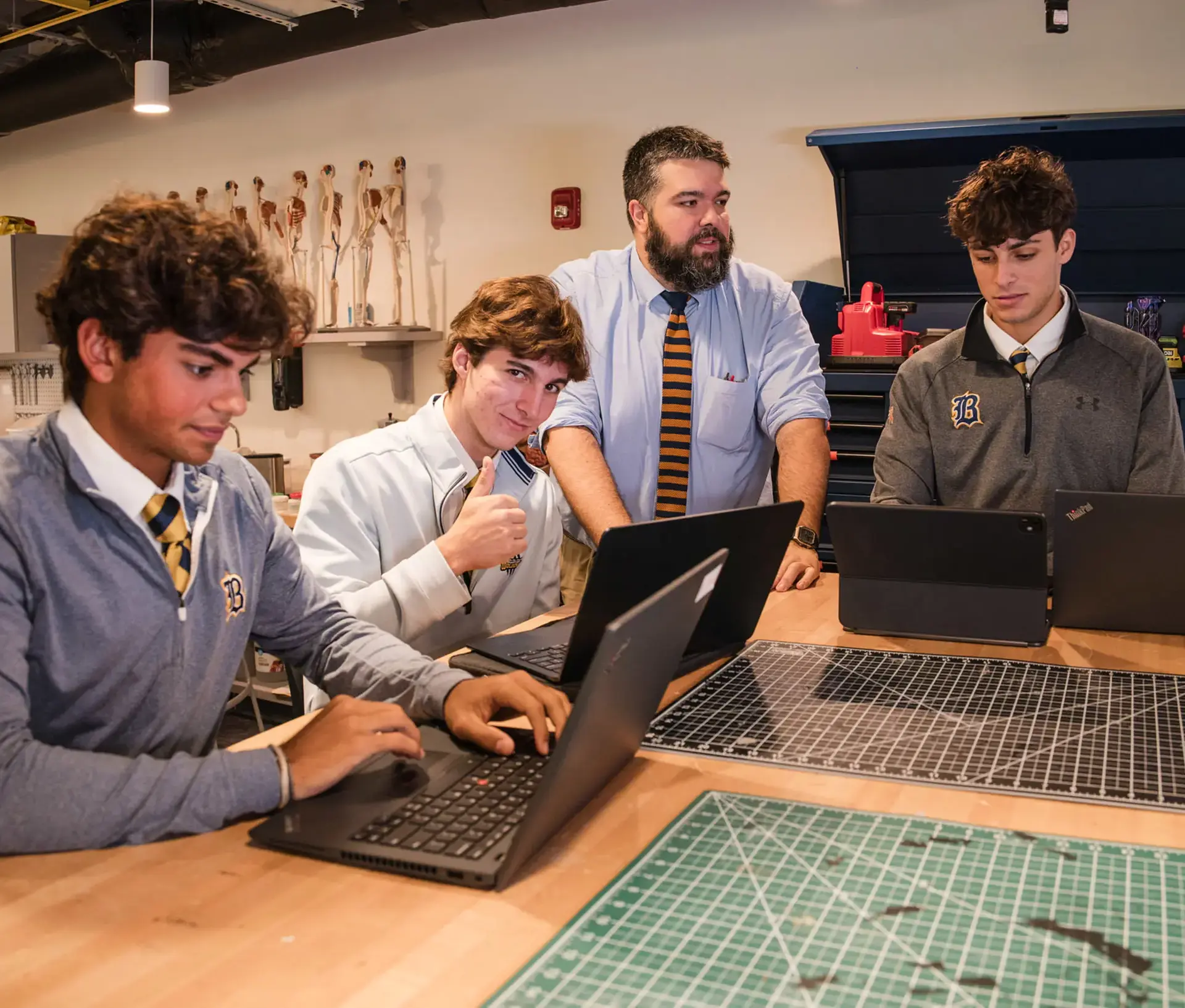 Belen Jesuit students working together in a class.