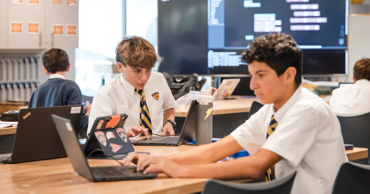 Belen Jesuit students working on computers in the Roberto C. Goizueta Innovation Center.