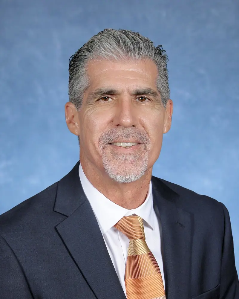 Alumni Association Executive Director Mr. Carlos Bravo 