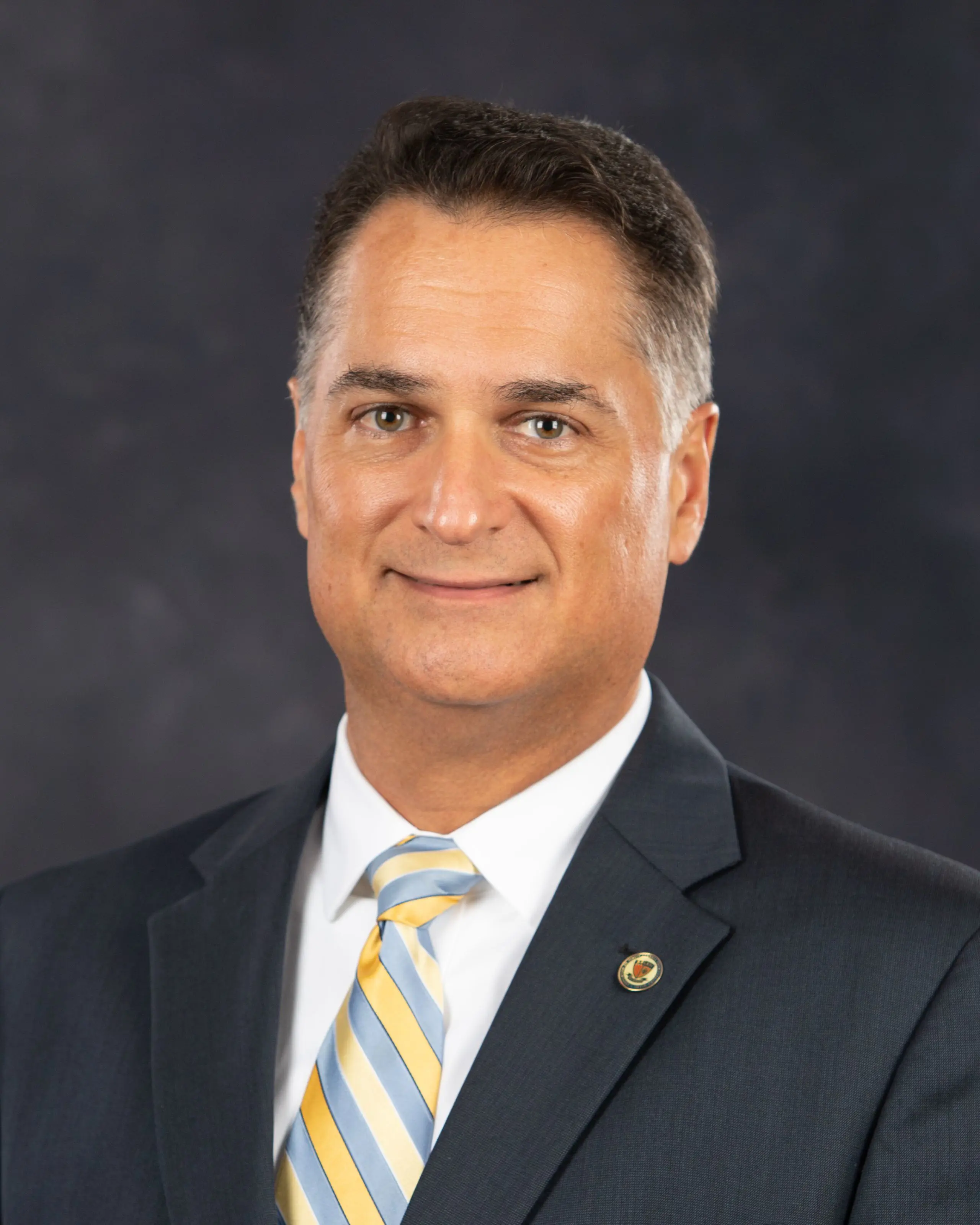Headshot picture of Belen Alumni Board of Directors Vice President, Carlos Hernández, class of 1988