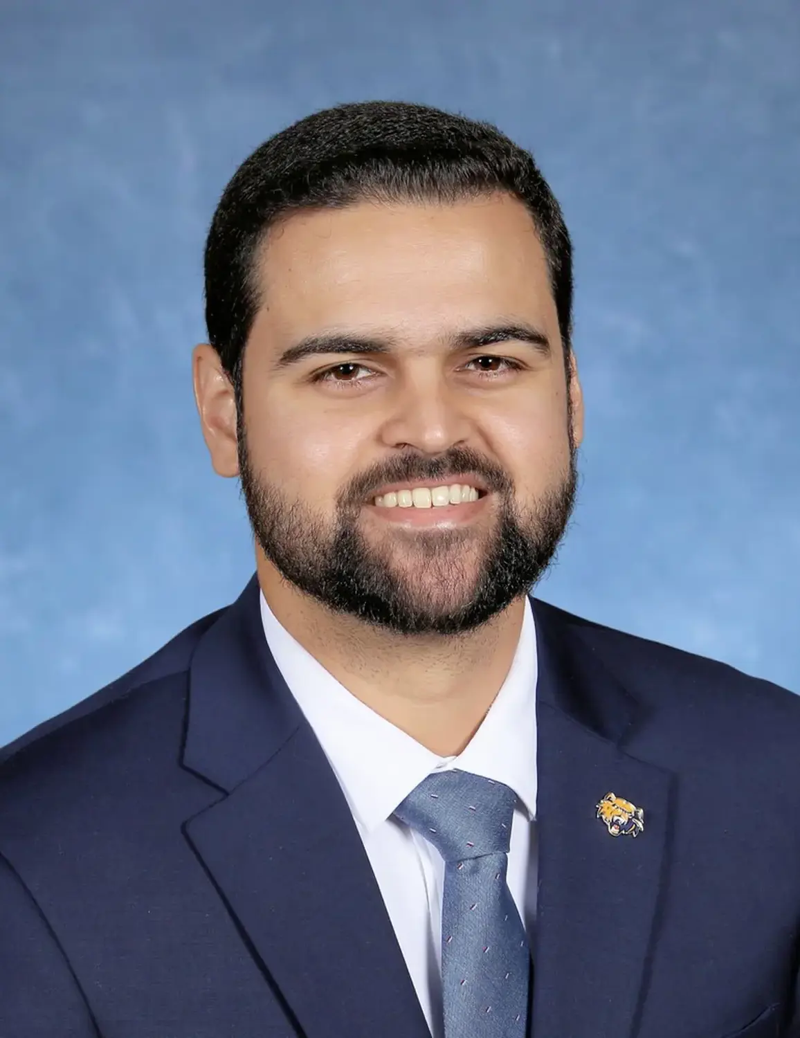 Mr. Carlos 'CJ' Cristobal '16, Communications Specialist
