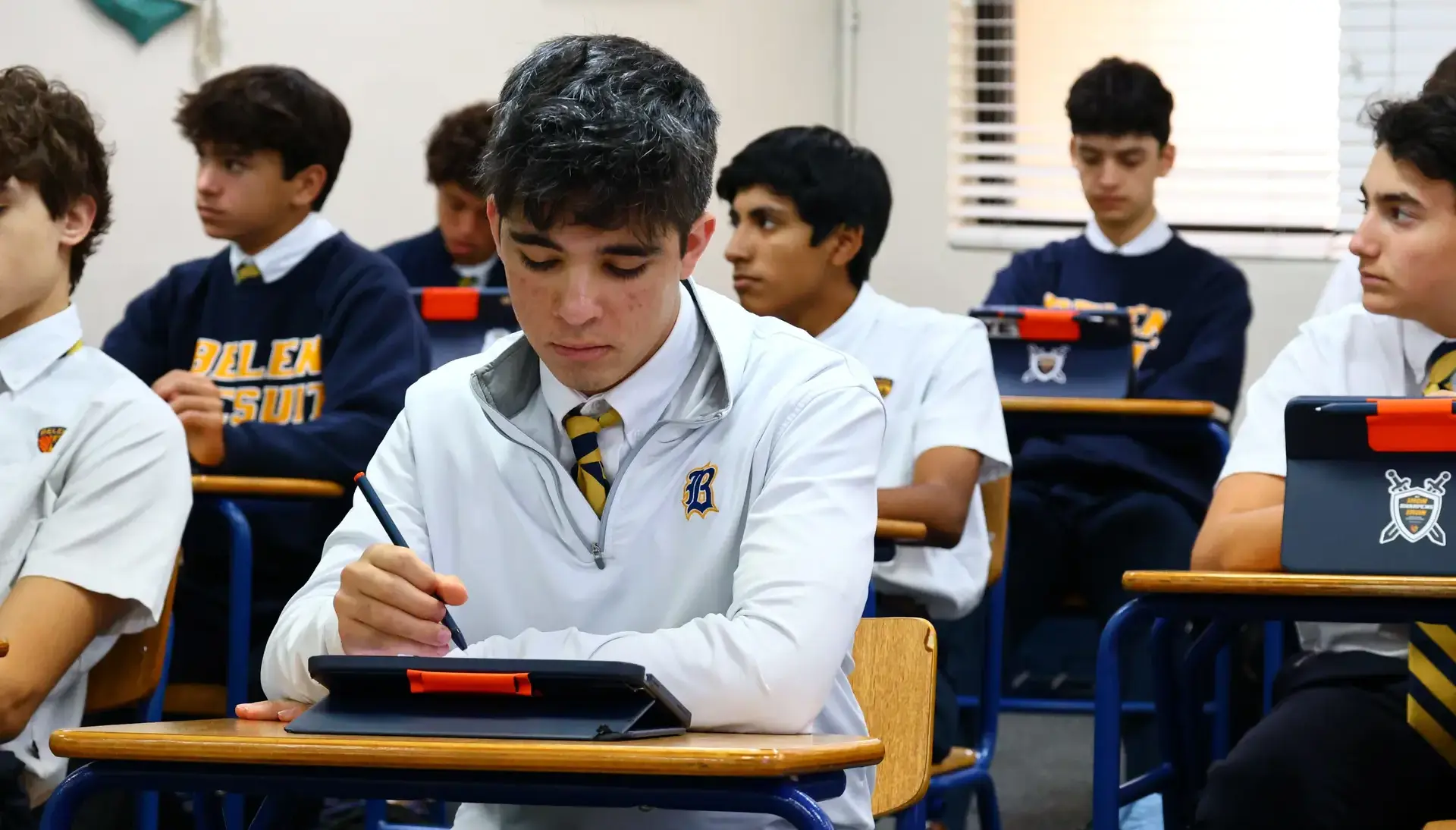 Belen Jesuit students pictured in their Honors British Literature Dual Enrollment class.