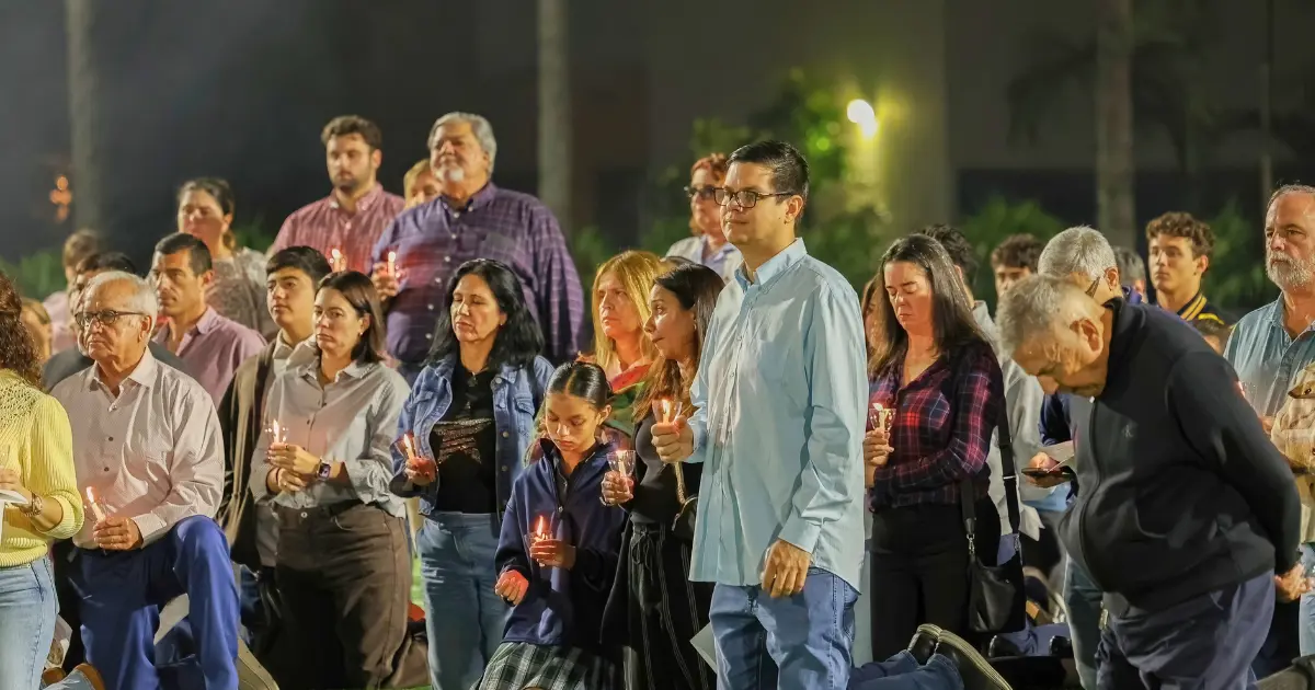 Members of the Belen community attend the Eucharistic Procession. 