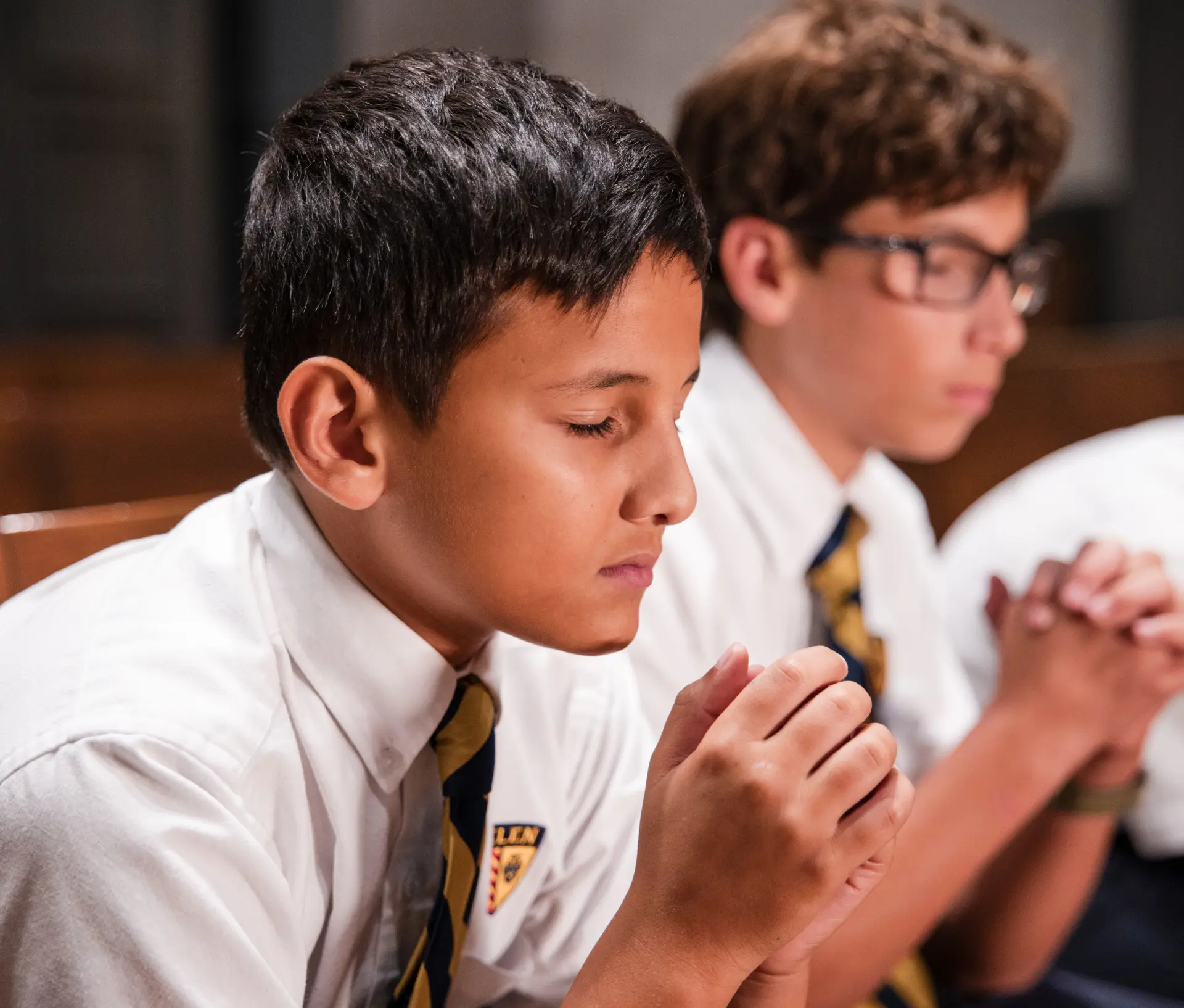 Belen Jesuit students praying in the Chapel of the Immaculate Conception. 