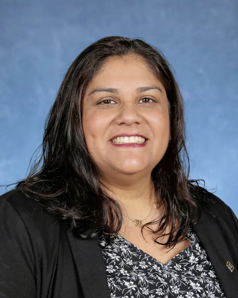 Yearbook picture of Belen Jesuit Director of Communications Teresa Martinez