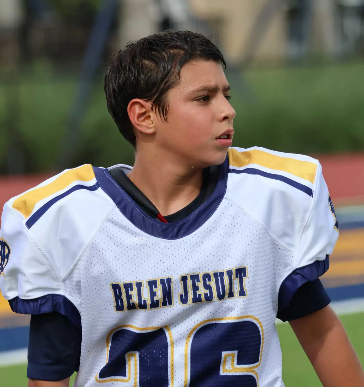Mateo Mezerhane ‘32 in school football uniform