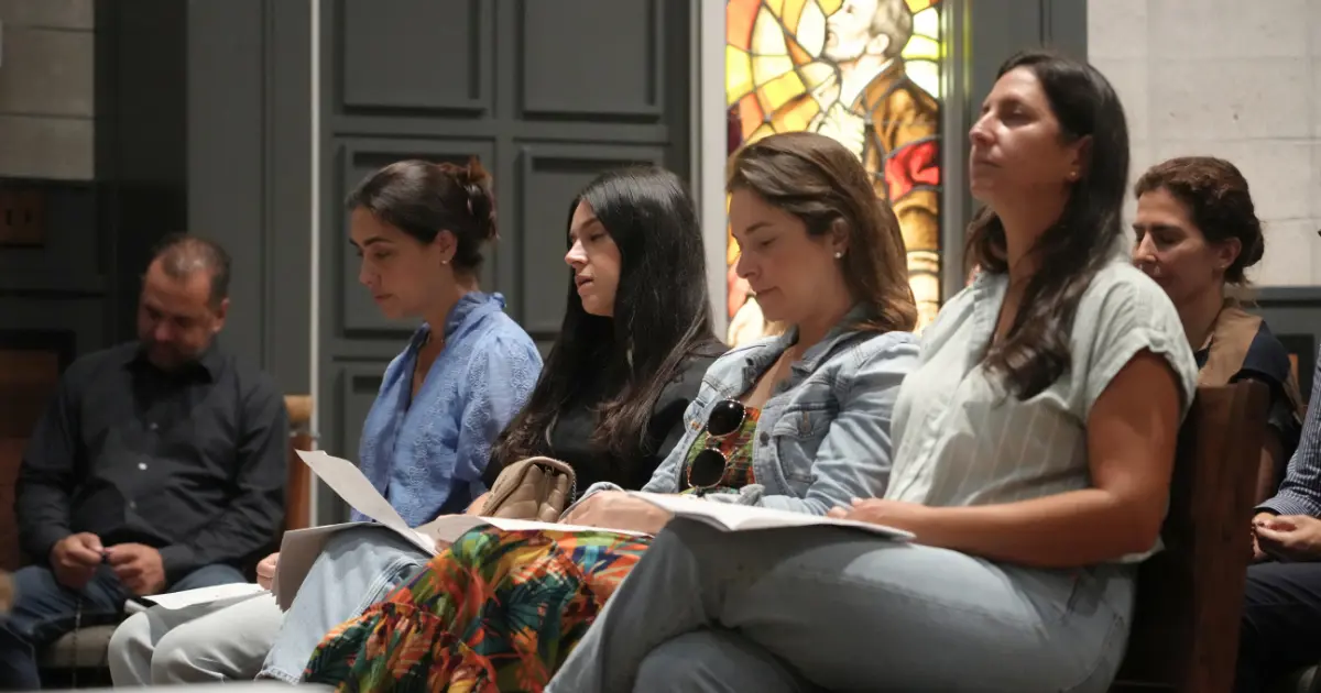 Parents participate in the monthly rosary at the Chapel of the Immaculate Conception.