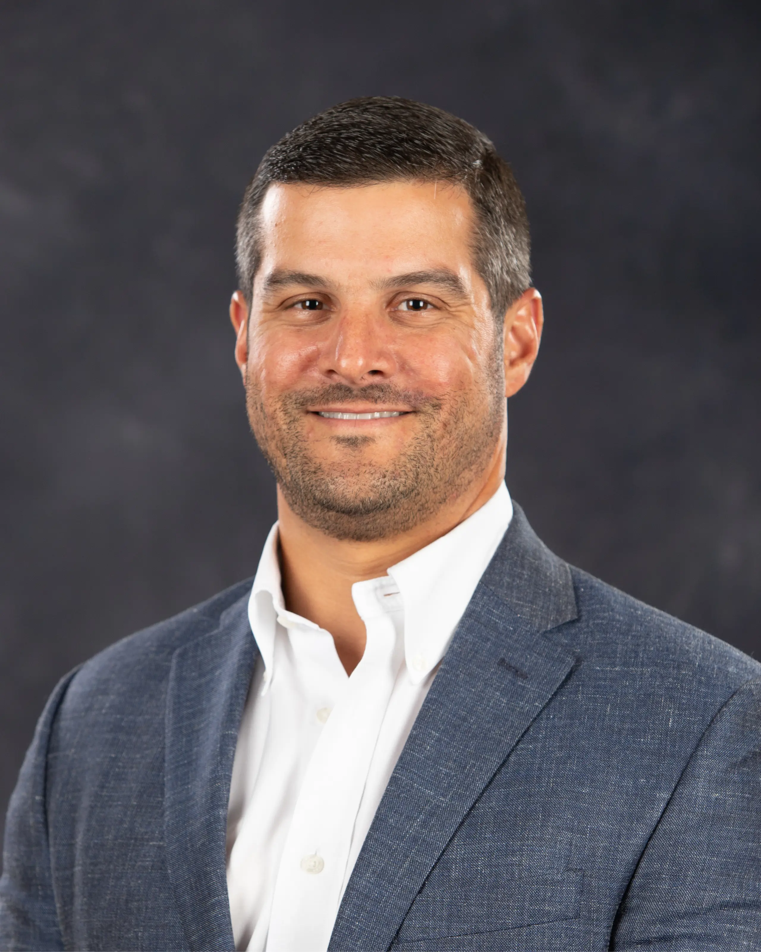 Headshot picture of Belen Alumni Board of Directors Treasurer, Thomas Pla, class of 2000