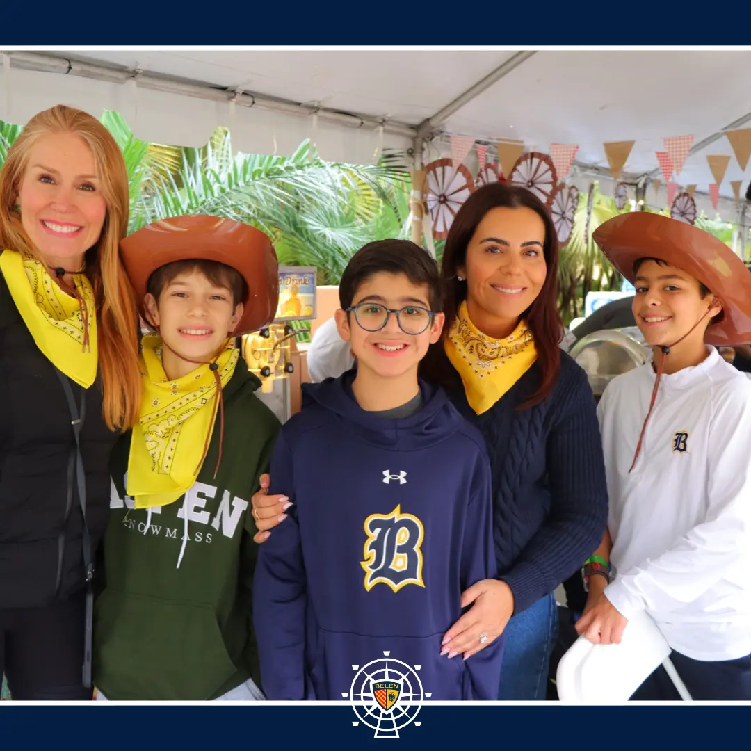 Belen parents and students working side by side at Tombola booth.