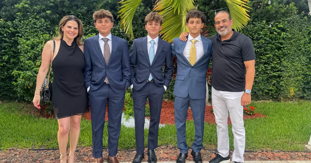 Family picture of Jessica and Carlos Bonzon with their sons. 