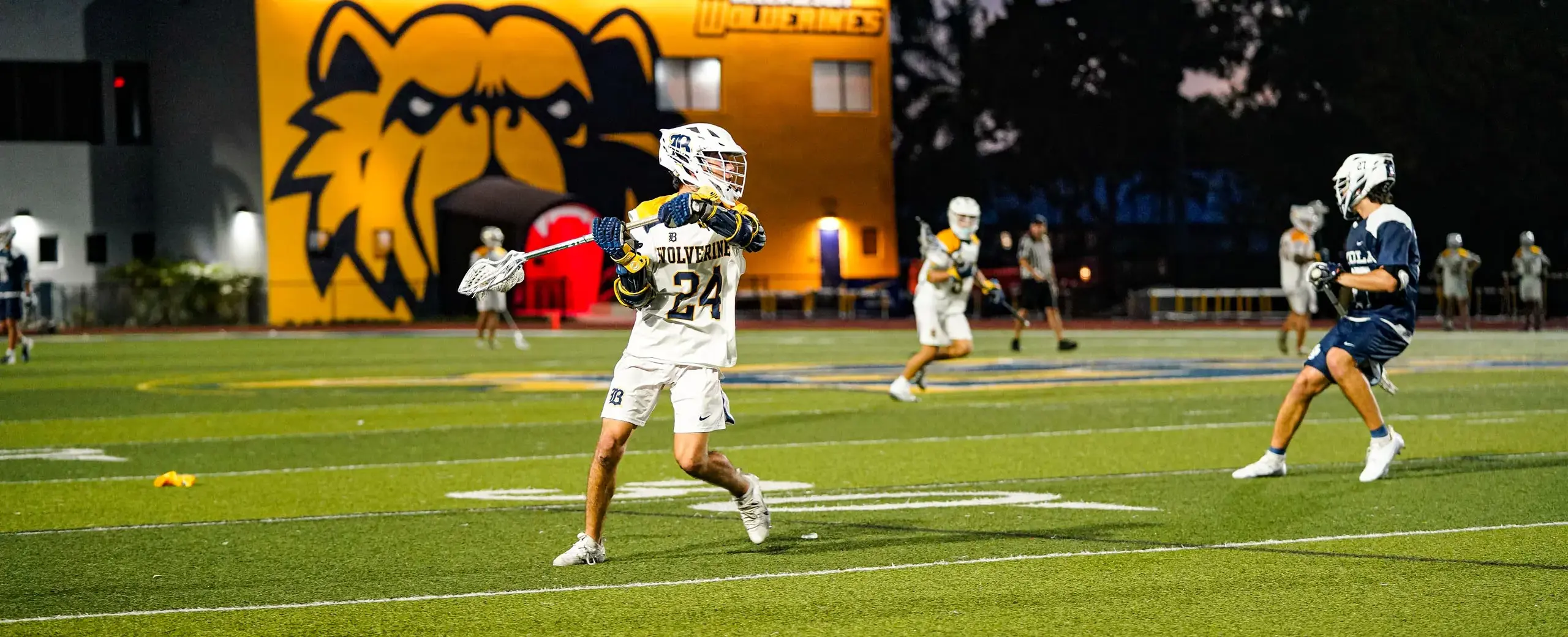 Belen Jesuit students playing in a Lacrosse game.