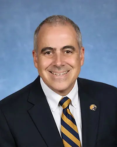 Yearbook picture of Belen Jesuit Executive Director of Advancement and Alumni Relations, class of 1994
