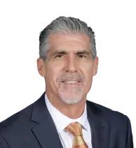 Yearbook picture of Belen Jesuit Director of the Alumni Office, Carlos Bravo, class of 1987