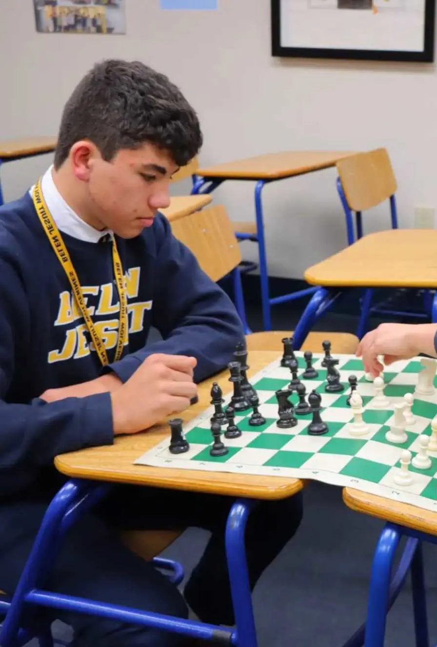 Belen Jesuit students playing chess.